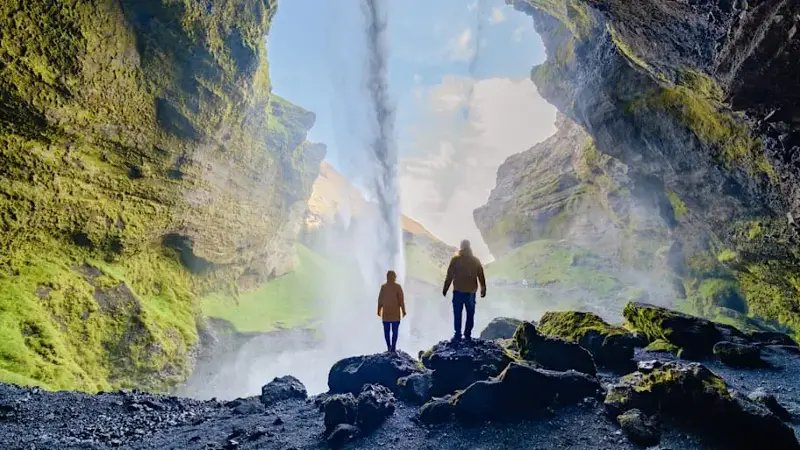 Exploring the majestic Kvernufoss waterfall in Icelands stunning landscapes
