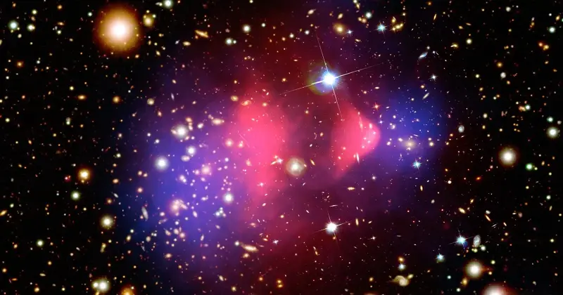 The Bullet Cluster, where a collision separated a galaxy cluster’s hot gas from the bulk of its mass, illustrating how ordinary matter can be pulled away from dark matter