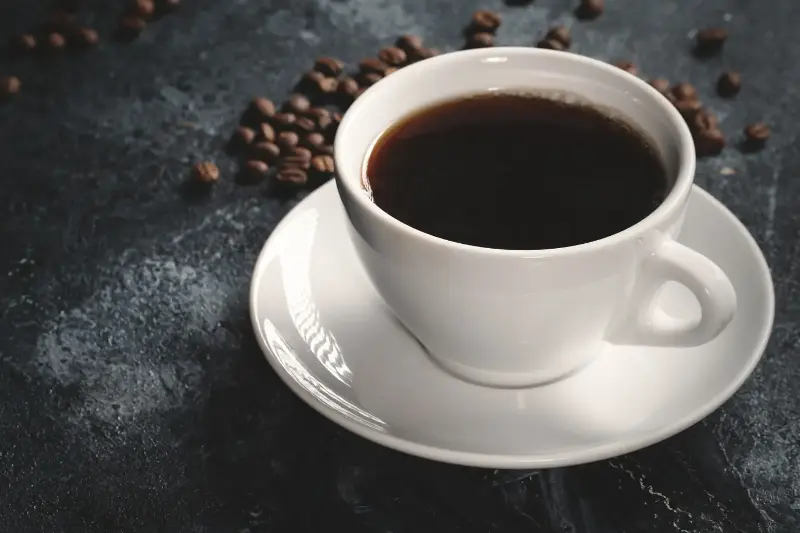 AHA states that drinking up to five cups of black coffee daily is safe for adults, potentially reducing heart disease risk. 