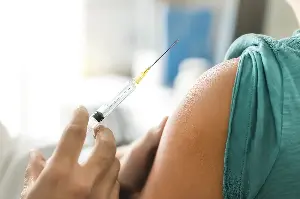 Is your gut biome causing a vaccine fever reaction? Healthier diet may help