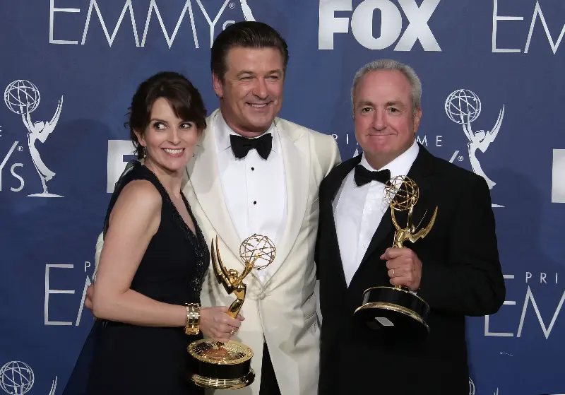 ‘30 Rock’ creator Tina Fey, Alex Baldwin and Lorne Michaels after winning big at the 2007 Emmys (Getty Images)