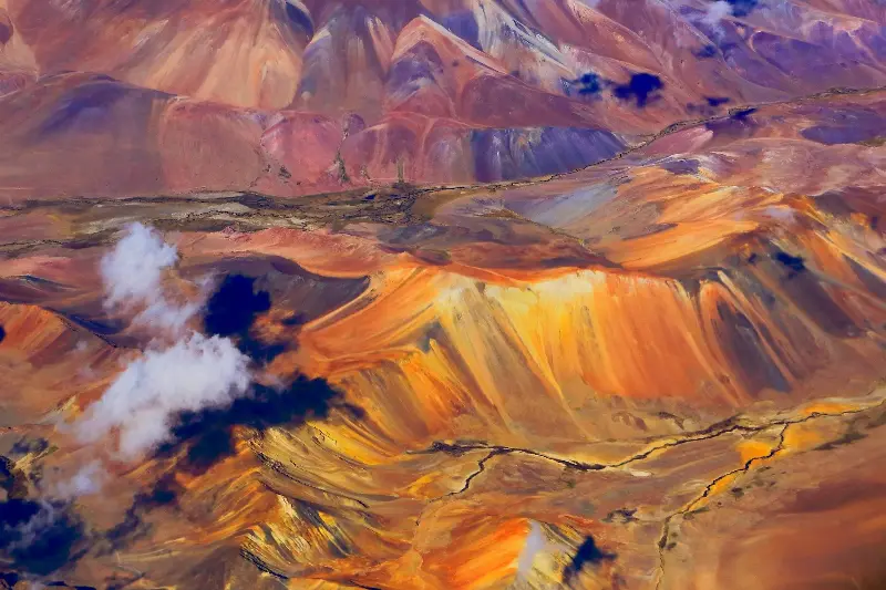 Take in the colourful canyons and towering volcanoes of The Atacama Desert - agustavop/iStockphoto