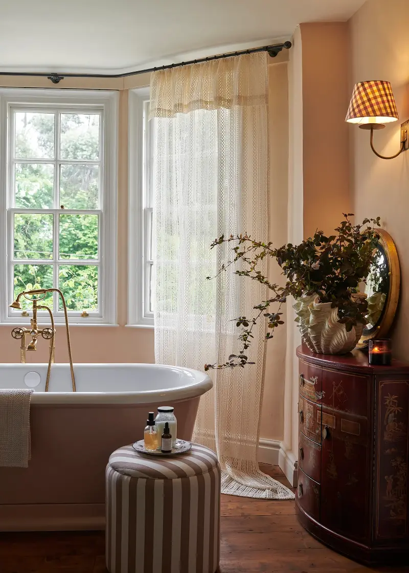 Choosing lamps with fabric shades is another way to soften light in the bathroom  (Image credit: Tori Murphy)