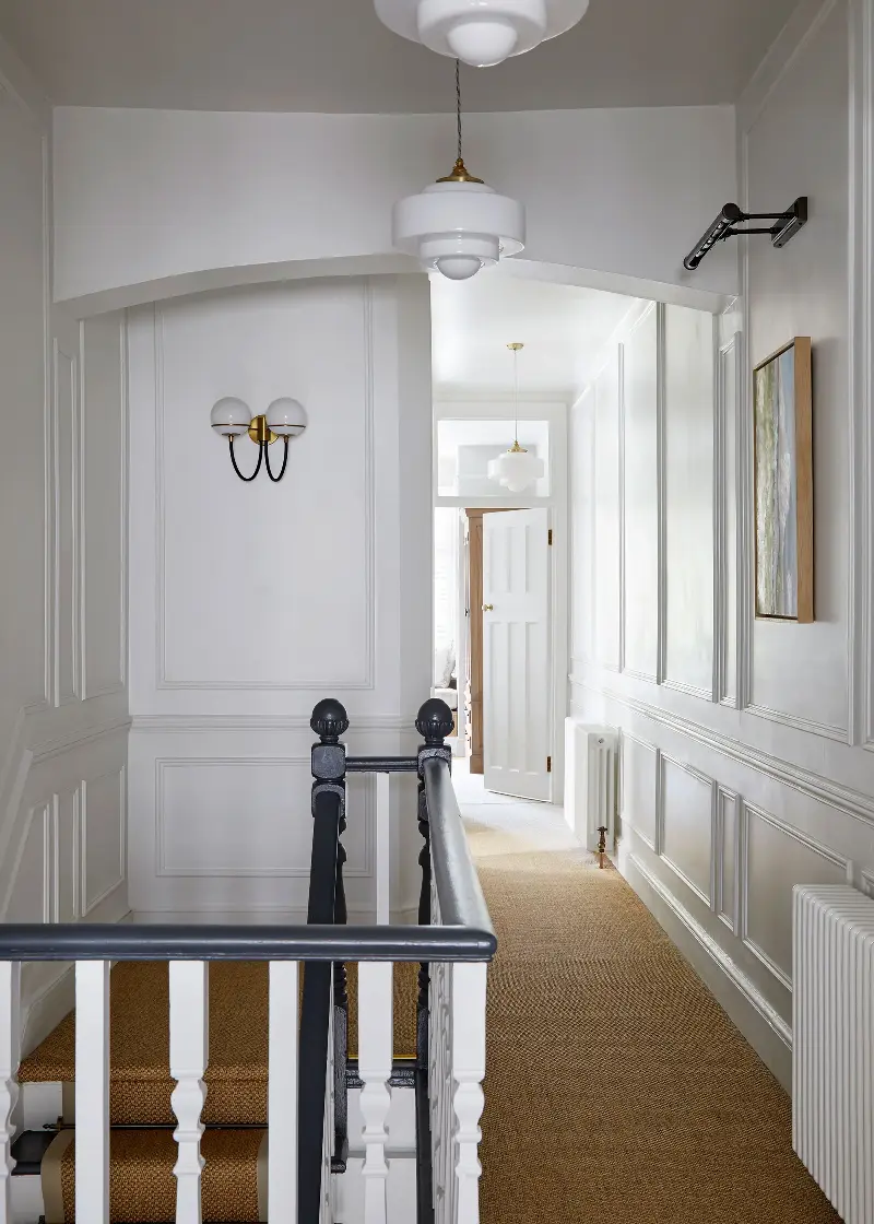 Layered lighting on the landing is more restful in the evening (Image credit: Anna Stathaki; Design: Souq.Studio)