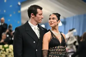Callum Turner 'breaks down in tears' as Hollywood star marries Dua Lipa in London