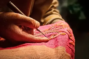 Could making fewer clothes create a fairer fashion industry?