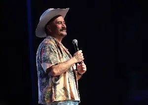 With 10 cats and a cowboy hat, Alfred Robles is building his comedy career