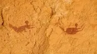 Bizarre 9,000-year-old rock art depicting swimmers in what is now the Sahara Desert.
