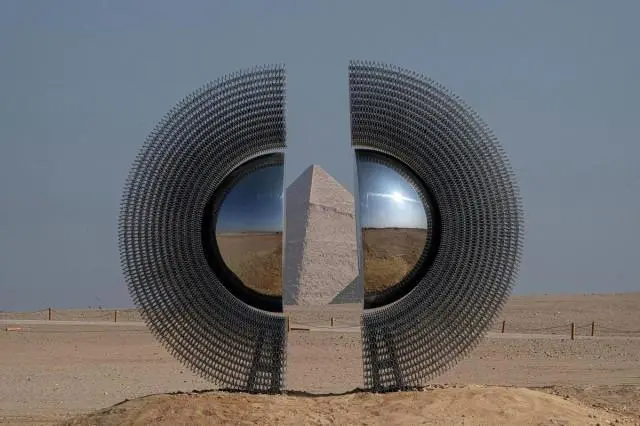 The art installation The Shen by artist by Mert Ege Kose stands near the Giza pyramids necropolis during the fifth edition of the Forever is Now art exhibition by Art d’Egypte on November 11, 2025. Khaled Desouki/ AFP