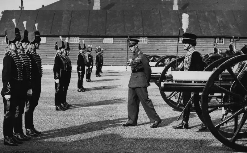 King George VI is seen during a visit to the St. John’s Wood barracks.