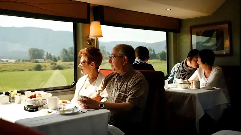 Passengers enjoy breakfast with a view aboard the Rocky Mountaineer on July.