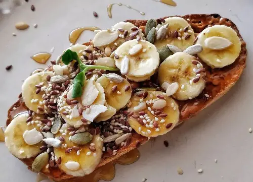 Banana, dates, peanut butter honey toast