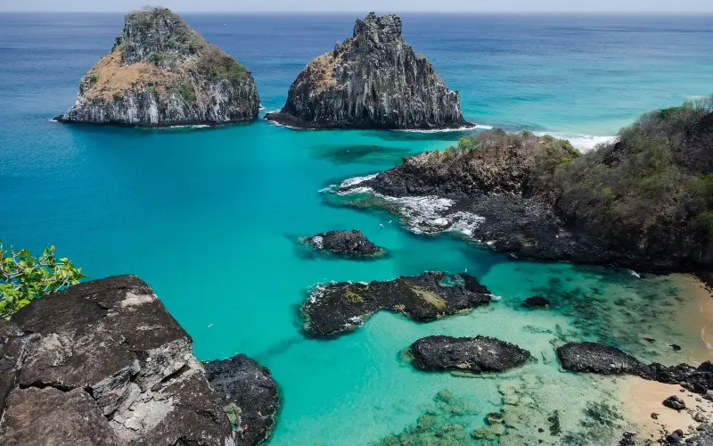 Swap tourist-packed Rio for the stunning Baía dos Porcos on the island of Fernando de Noronha in Brazil’s north-east - Vitor Marigo / Aurora Photos