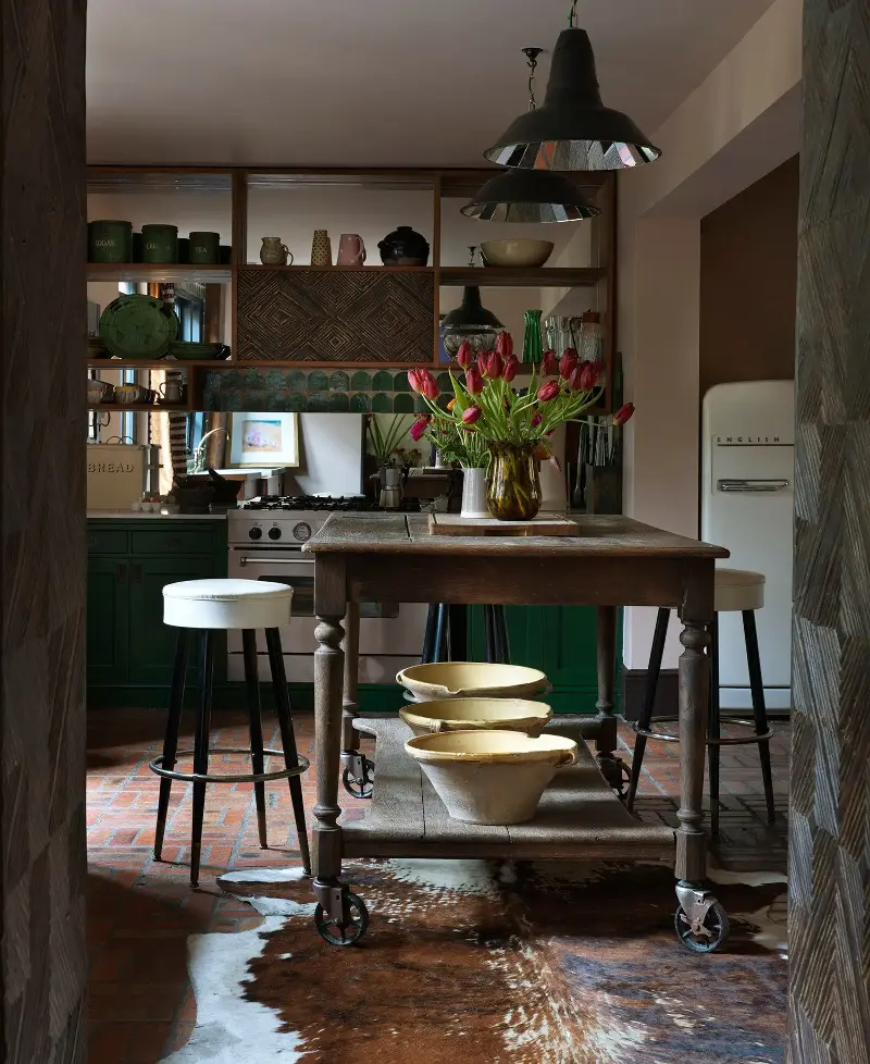 Dellal’s kitchens have a lived-in feel, thanks to the use of vintage furniture and organic materials - Simon Upton