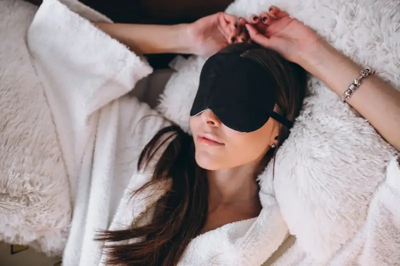 Use a sleep mask to block out harsh lights in the morning when you sleep. 