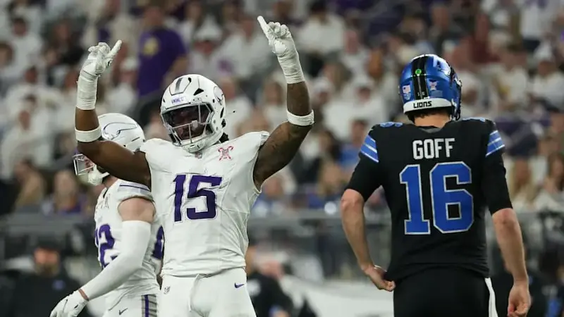 Dallas Turner celebrates after a play as Detroit Lions quarterback Jared Goff reacts in the second half at U.S. Bank Stadium.