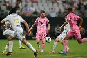 Messi scores twice on his first start since World Cup final