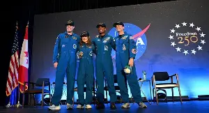 Artemis II astronauts return to Houston, reunited with their families.