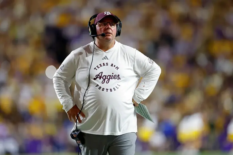 BATON ROUGE, LOUISIANA - SEPTEMBER 26: Head coach Mike Elko of the Texas A&M Aggies reacts during the first half of a game at Tiger Stadium on September 26, 2026 in Baton Rouge, Louisiana. (Photo by Tyler Kaufman/Getty Images)