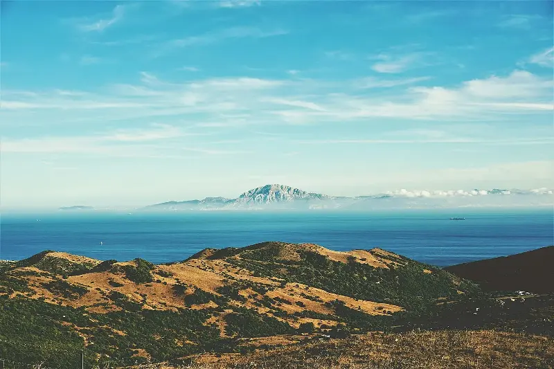 Modern view across the Strait of Gibraltar from Tarifa, Spain, towards the coast of Africa