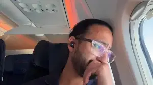 Indian-origin man breaks down while flying business class, recalls dreaming of the same seat as a child