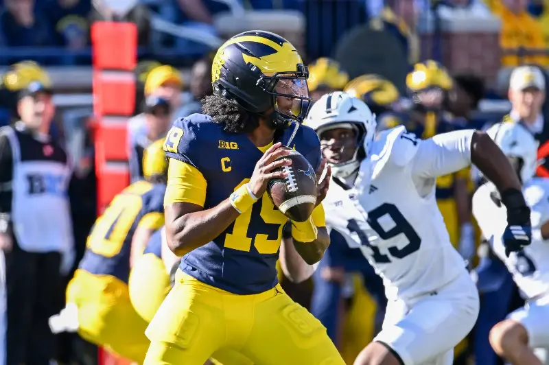 Bryce Underwood #19 of the Michigan Wolverines looks to throw the ball downfield during the first half of a college football game against the Penn State Nittany Lions at Michigan Stadium on October 17, 2026, in Ann Arbor, Michigan. (Photo by Aaron J. Thornton/Getty Images)