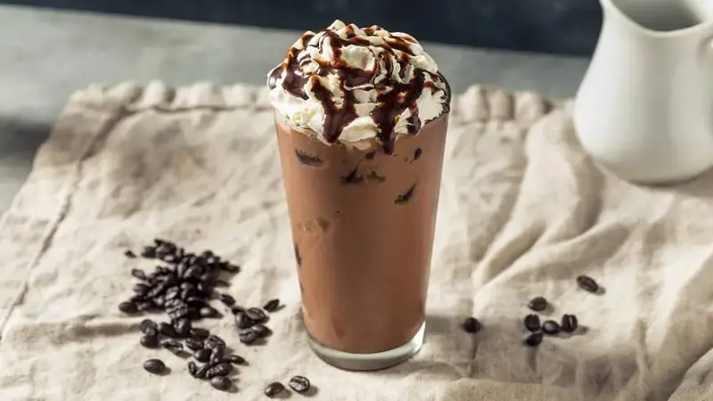 Iced mocha beverage with whipped cream