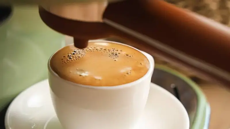 Coffee machine making espresso