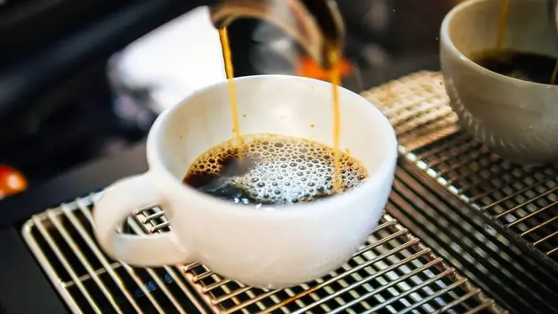 Americano being brewed from machine