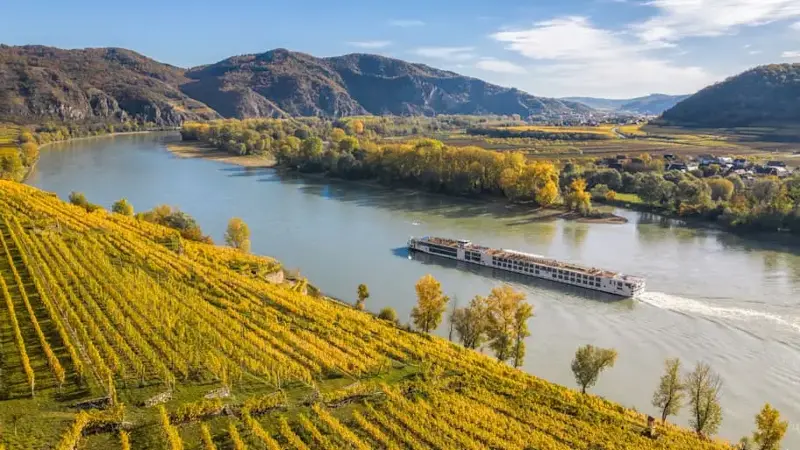 Autumn panorama of Wachau valley (Unesco world heritage site) with ships on Danube river near the Weissenkirchen village in Lower Austria, Austria