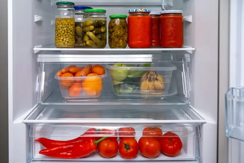The produce section of the refrigerator has both temperature and humidity control. 