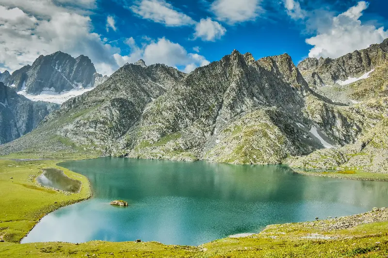 Gadsar Lake’s crystal waters reflecting Kashmir’s serene alpine beauty.