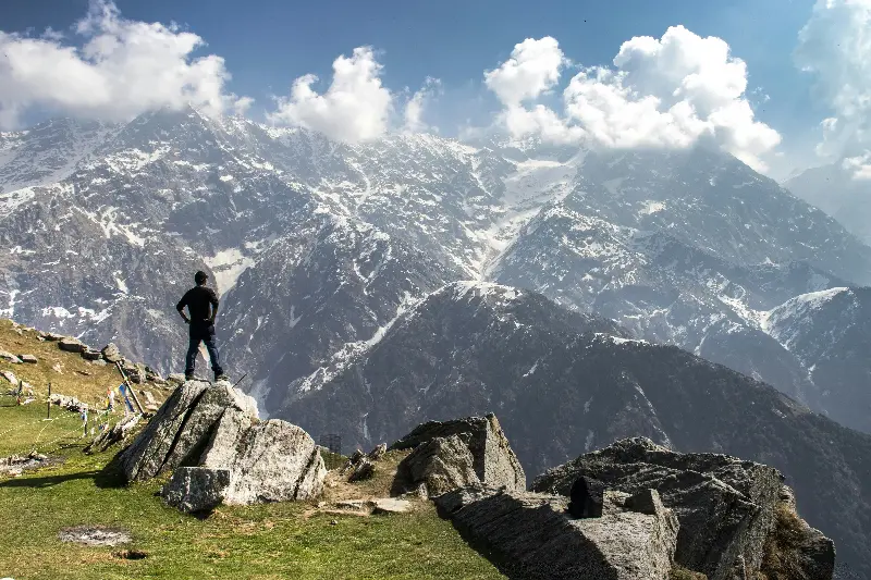 High on life; trekking Triund's stunning Himalayan panorama.