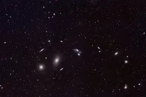 Astronomers scanning deep-space images by eye found dozens of ghostly dwarf galaxies that previous surveys had missed.