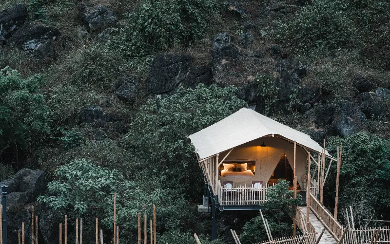 AUKO’s 30 eco-wellness lodges are set along the Son River, within the Phong Nha–Ke Bang National Park - Frederik Wissink