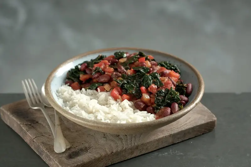 Cavolo nero does double duty here, stirred through the chilli and roasted until crisp for the topping (Discover Great Veg)