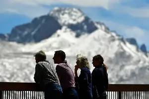 Why did Rocky Mountain keep its reservation system while other national parks scrapped theirs?
