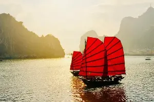 Admire Ha Long Bay from a three-walled sailboat.