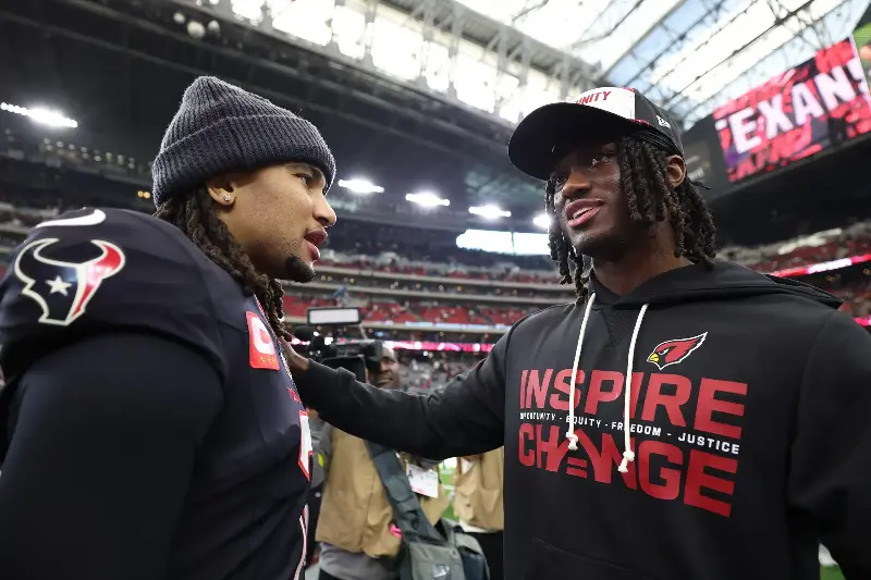 C.J. Stroud #7 of the Houston Texans speaks with Marvin Harrison Jr. #18 of the Arizona Cardinals after the game at NRG Stadium on December 14, 2025 in Houston, Texas. (Photo by Tim Warner/Getty Images)