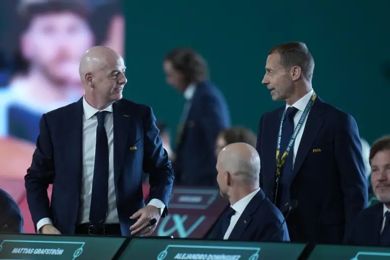 epa12924687 FIFA President Gianni Infantino (L) and UEFA President Aleksander Ceferin attend the 76th FIFA Congress 2026 in Vancouver, Canada, 30 April 2026. EPA/BOB FRID