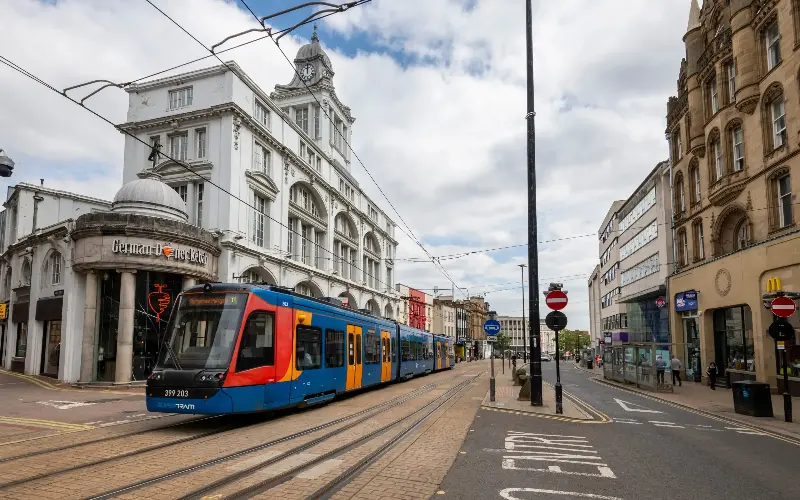 A tram moves along Sheffield’s streets - R A Kearton