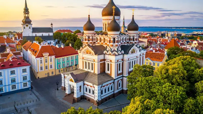 Alexander Nevsky cathedral and St Mary's Cathedral at sunset in Tallinn, Estonia