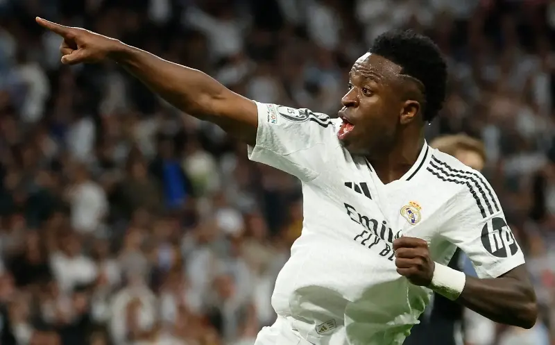 The one place Vinicius Jr definitely wasn’t pointing to was Arsenal, the Brazilian staying at Real Madrid - Pierre-Philippe Marcou/AFP