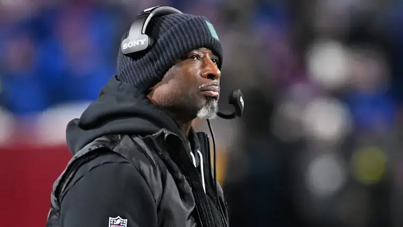 Aaron Glenn looks on during the second half against the Buffalo Bills at Highmark Stadium. 