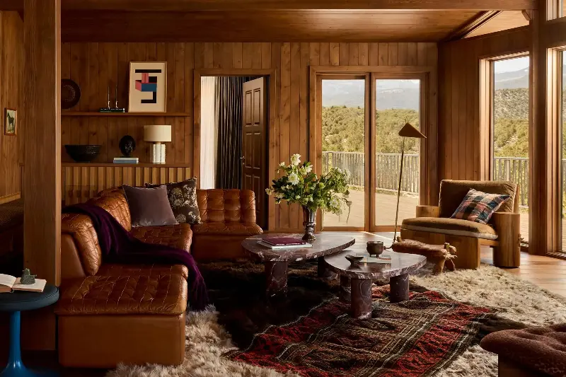 The brown living room sofa is one of Susannah's favorite pieces in the home and was sourced via 1stDibs.  (Image credit: Malissa Mabey. Design: Susannah Holmberg Studios. Styling: Jen Paul)