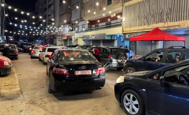 People leave in their cars after Israeli strikes on Beirut's southern suburbs, Lebanon, March 2, 2026. Picture taken with a mobile phone. REUTERS/Ahmad Al Kerdi