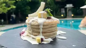 Do protein maxxing right with these delicious protein pancakes recipe served with a healthy Greek yoghurt cocoa drizzle