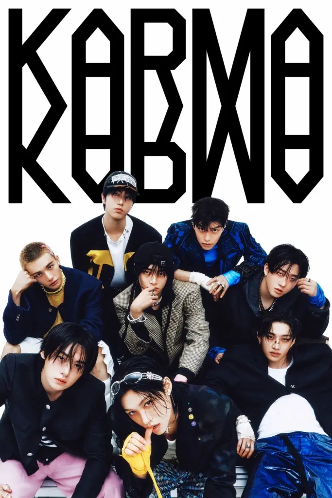 A group of eight individuals posing together in stylish outfits, with a bold 'KARMA' logo prominently displayed above them.