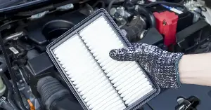 Should you clean your car's air filter, or should you always replace it?