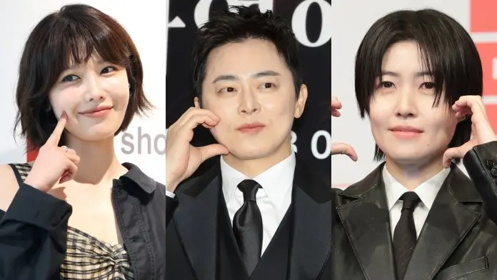 Choi Sooyoung, Jo Jung-suk, Shim Eun-kyung posing for a photo, each making a gesture with their hands near their faces. Choi Sooyoung on the left is smiling and pointing to ㅗher cheek, while Jo Jung-suk in the center has a neutral expression and a subtle hand gesture. , Shim Eun-kyung on the right is also smiling and making a similar hand gesture.
